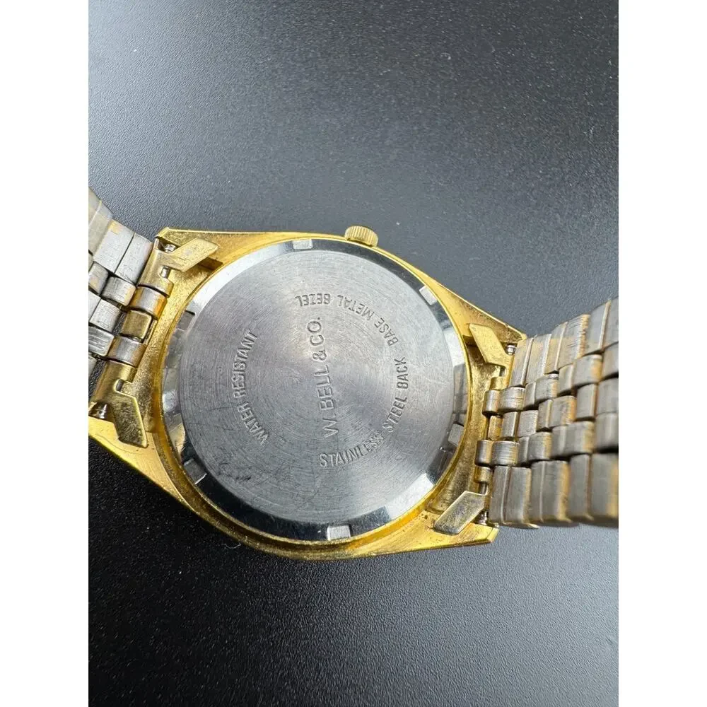 La Cloche Gold Tone Watch Fluted Bezel Diamond Dial